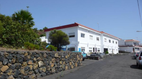 Гостиница Apartamentos Monte Breñas  Вилья-Де-Масо
